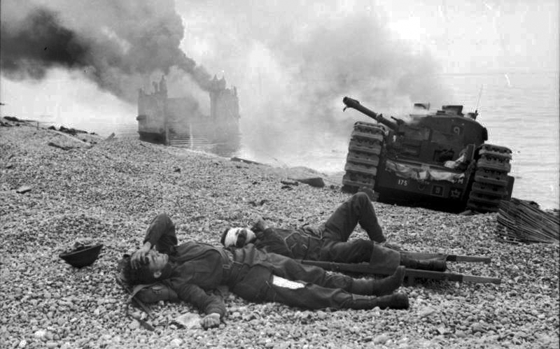 Wounded Canadian soldiers and destroyed equipment on the beach at Dieppe.