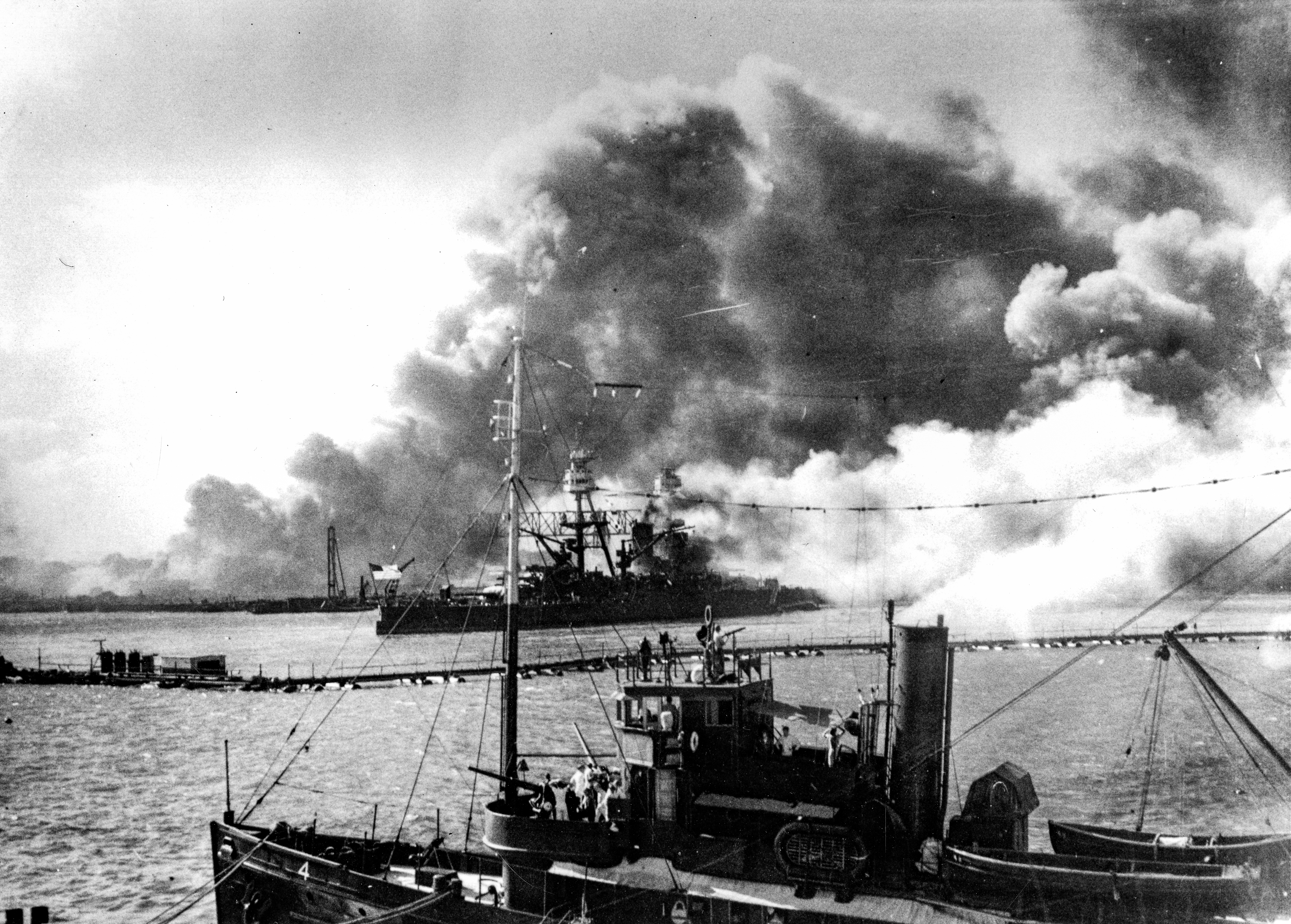 USS Nevada (BB-36) under attack by Japanese dive bombers, Pearl Harbor, TH, 7 December 1941