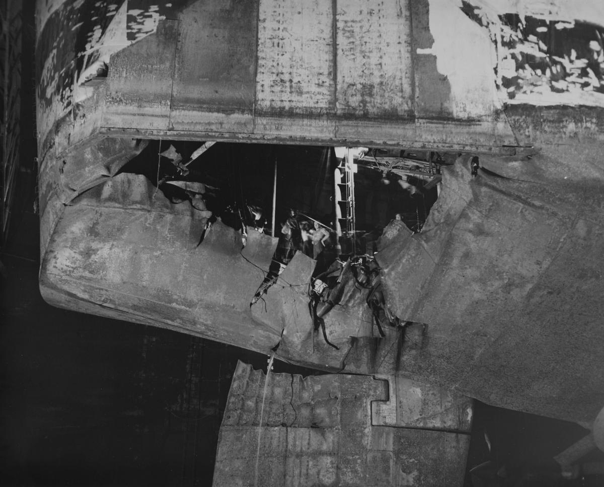 Extensive torpedo damage to the stern and rudder of USS Houston (CL-81)