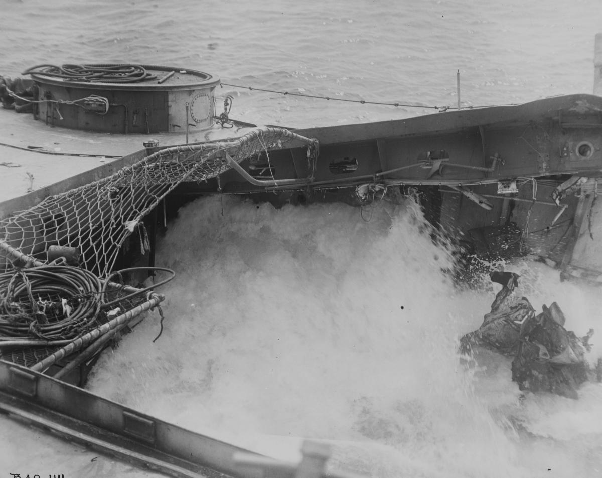Flooding in the USS Houston's (CL-81) hangar after a second torpedo hit at the Battle of Formosa.