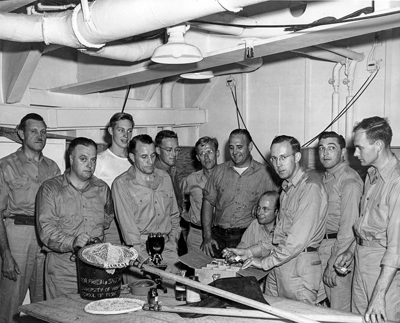 Ichthyologists with the University of Wisconsin with their equipment on board a ship during Operation Crossroads
