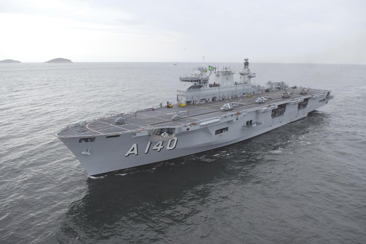 Aerial port bow view of the Brazilian aircraft carrier PHM Atlântico at sea.