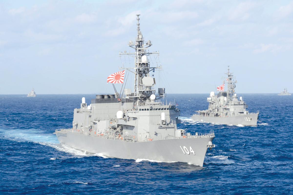 The Japan Maritime Self-Defense Force Murasame-class destroyer JS Kirisame and the Hatsuyuki-class destroyer JS Asayuki steam in formation during exercise Keen Sword 19.