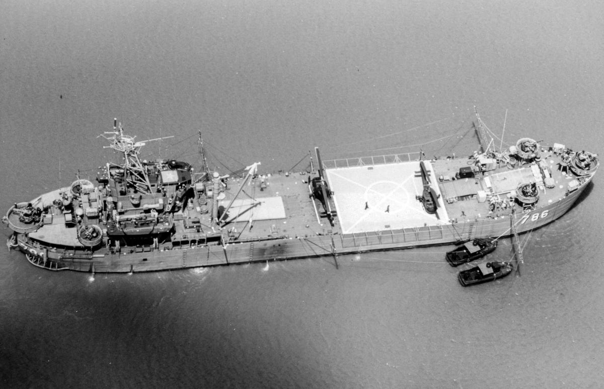 The USS Garrett County (LST-786) anchored in the Co Chien River in June 1968