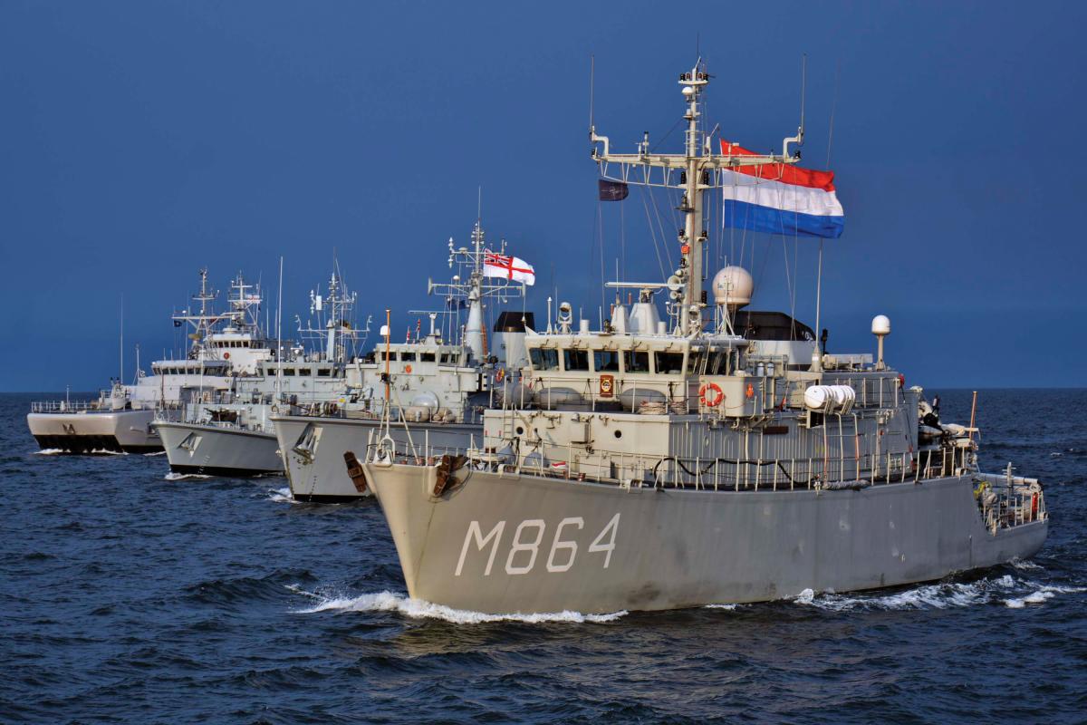 The Dutch mine hunter HNLMS Willemstad transits in formation during exercises with NATO and the Estonian Navy