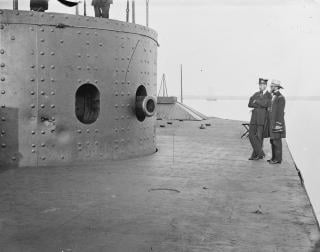 Damage near the starboard gun port of the Monitor’s turret is visible in this July 1862 photograph—damage that lines up with the damage evident on the artifact thought to be a portion of the long-lost turret shield.