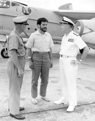 Flown on board a carrier at Yankee Station shortly after his ordeal, Klusmann relates his experience to Admiral Ulysses S. G. Sharp, Commander-in-Chief, Pacific Command (left), and Vice Admiral Roy L. Johnson, Commander, Seventh Fleet. 