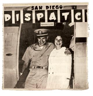 Klusmann and his wife emerge from the plane that has returned him to the United States after the naval aviator’s harrowing experience in Laos.