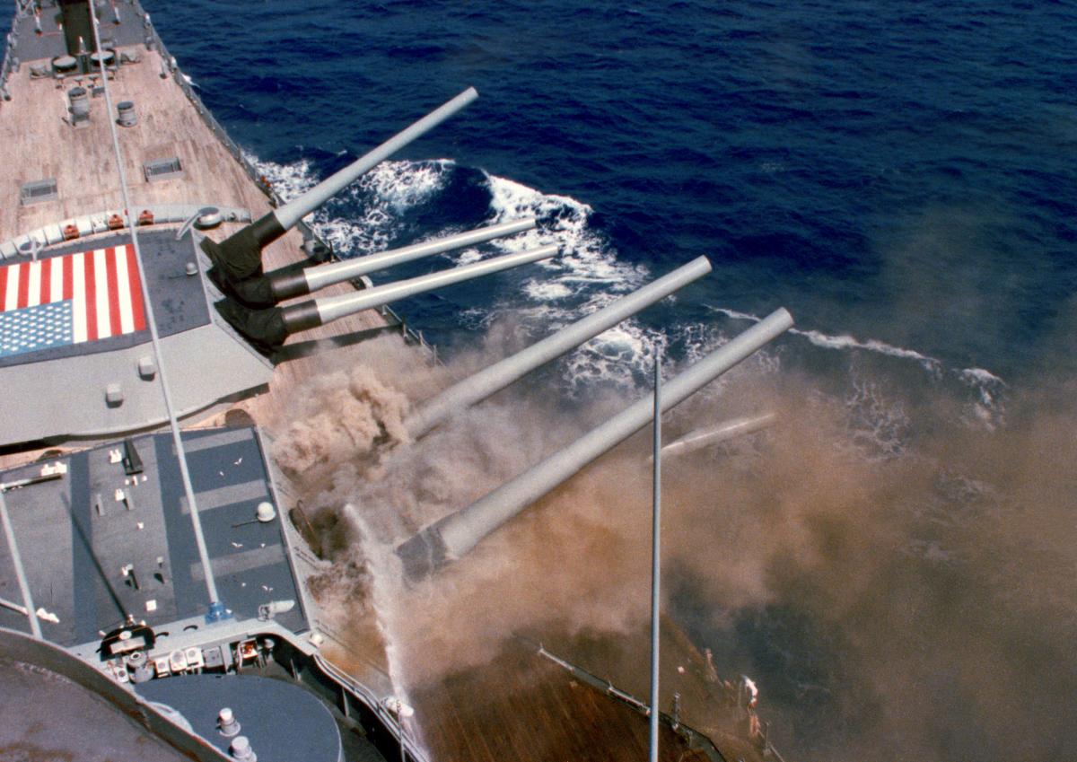 A photo taken from the bridge captures the explosion of the No. 2 16-inch gun turret aboard the battleship USS Iowa (BB-61)