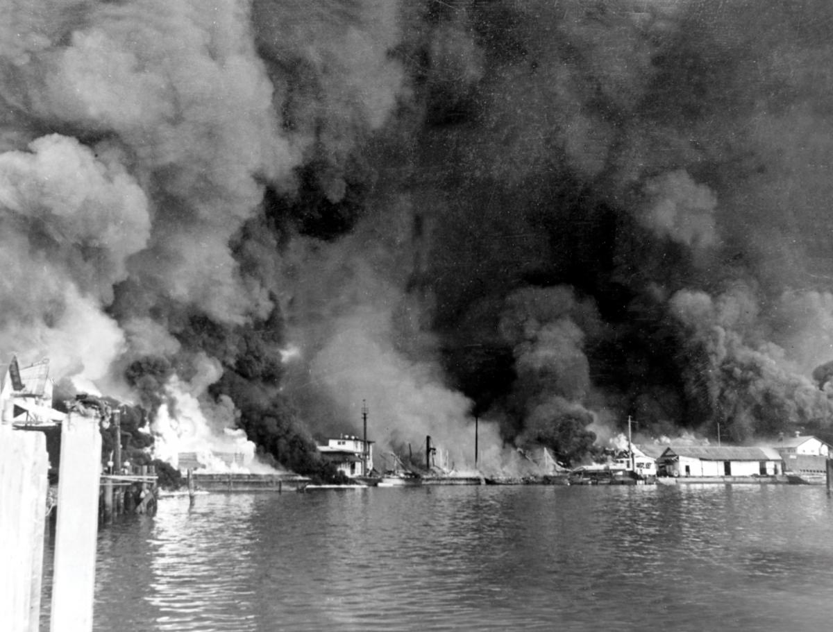 Flames engulf Cavite Navy Yard in Manila Bay on 10 December 1941