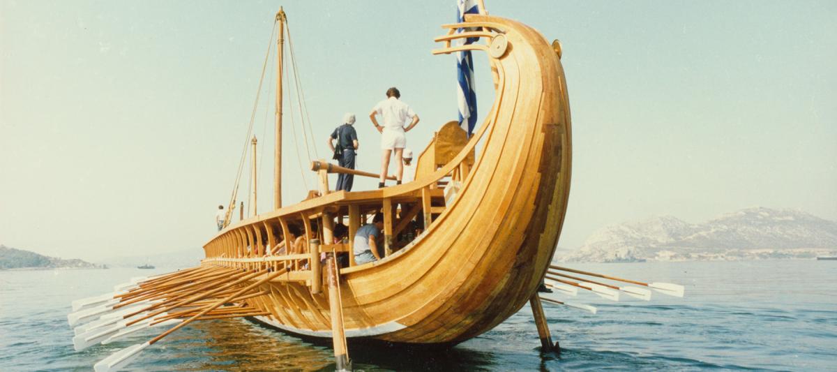 A stern view of the Hellenic Navy’s historic recreation of a trireme, named the HS Olympias, at ease with oars up in 1987. Much like carriers, galleys once were seen as the ultimate design for delivering naval power. 