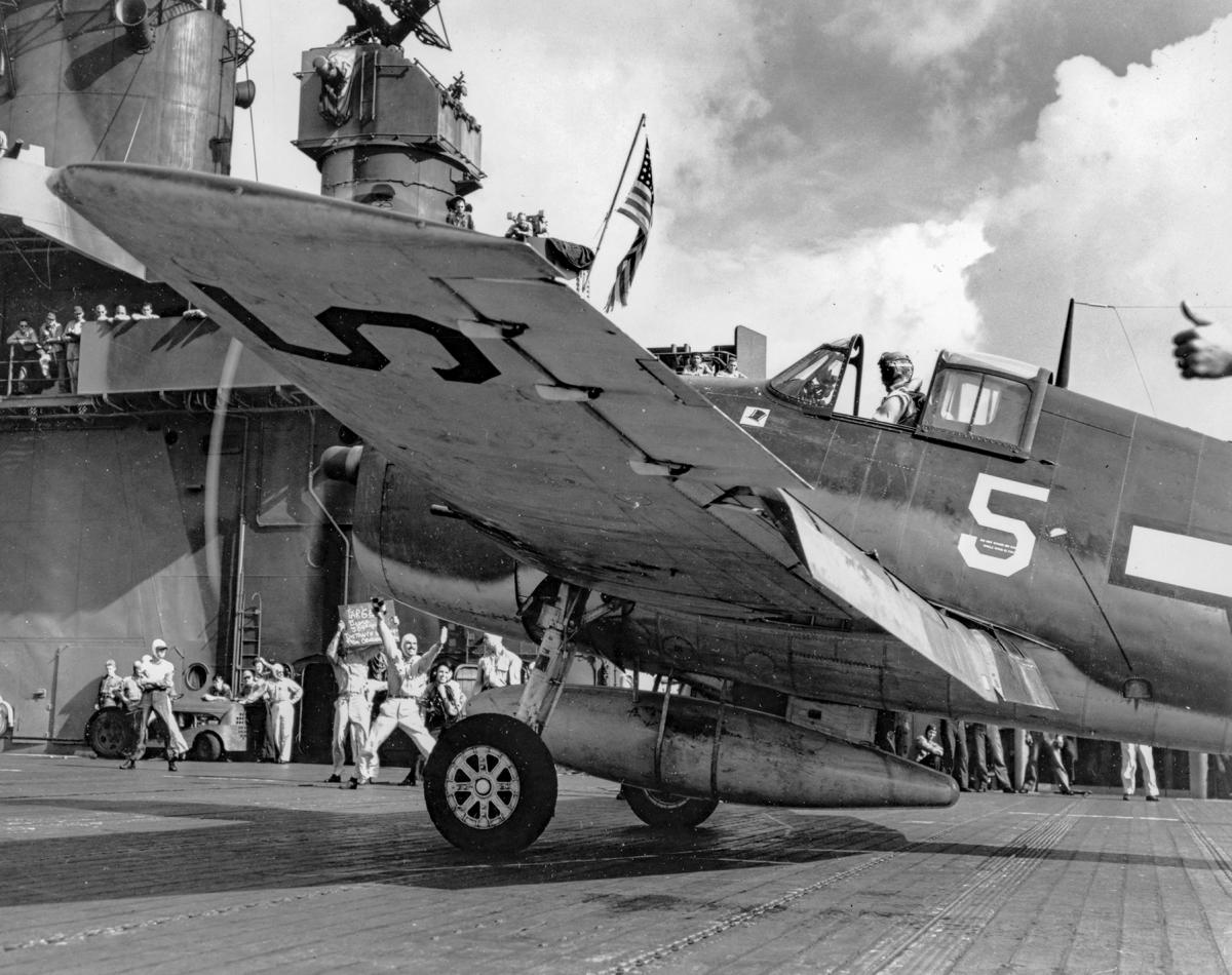Hellcat Fighter aircraft is launched from the aircraft carrier USS Yorktown during the Battle of the Philippines Sea.