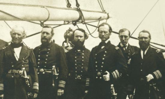 Rear Admiral John Dahlgren standing with his staff on board the sloop-of-war Pawnee off the Georgia coast in 1865