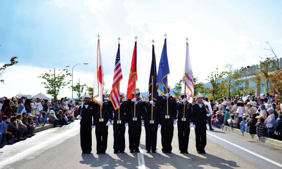 U.S. Navy Honor Guard from Misawa, Japan, marches in the 2015 Aomori Ten City Parade in Mutsu, Japan