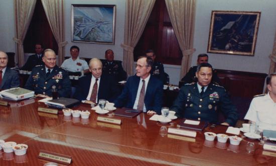 15 August 1990: President George H. W. Bush meets with the Joint Chiefs of Staff in the Pentagon to discuss the military response to the Iraqi invasion of Kuwait. (L. to r.: National Security Advisor Brent Scowcroft; General H. Norman Schwarzkopf, Commander-in-Chief U.S. Central Command; Secretary of Defense Dick Cheney; President Bush; General Colin Powell, Joint Chiefs Chairman; and Admiral David E. Jeremiah.)