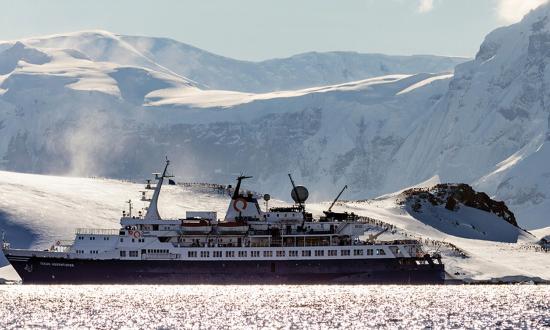 A passenger ship carries alpine mountaineering skiers to Antarctica. The Polar Code is a uniform and nondiscriminatory set of rules and regulations that provides a level playing field for all polar marine operators and managers.