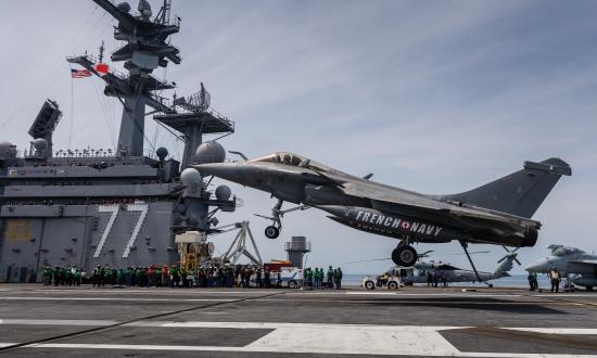 Right side view of a French Rafale-M lands on board the USS George H. W. Bush (CVN-77) at the start of a French squadron’s deployment with Carrier Strike Group Two
