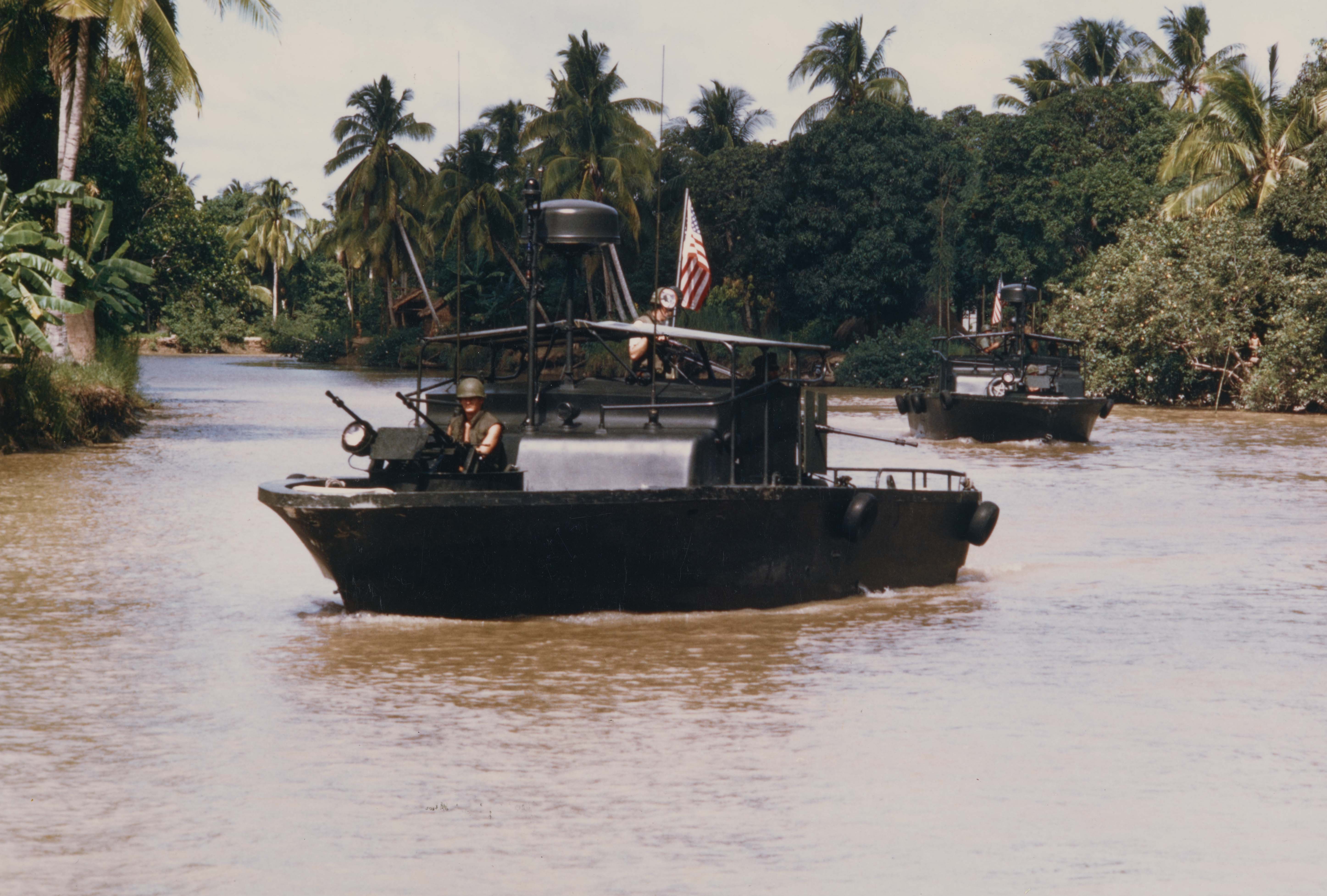 A U.S. Navy PBR patrols the Bassac River, Vietnam