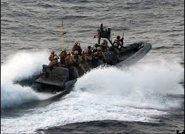 The Marine Force Recon platoon heads for the M/V Magellan Star.