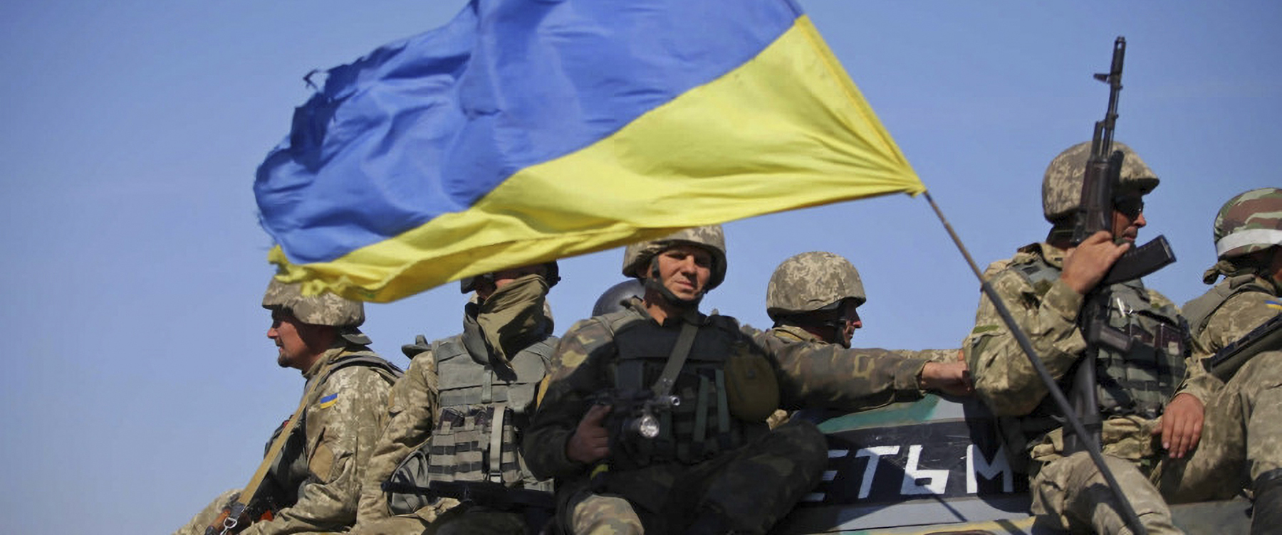 russian soldier war hero with a flag against the