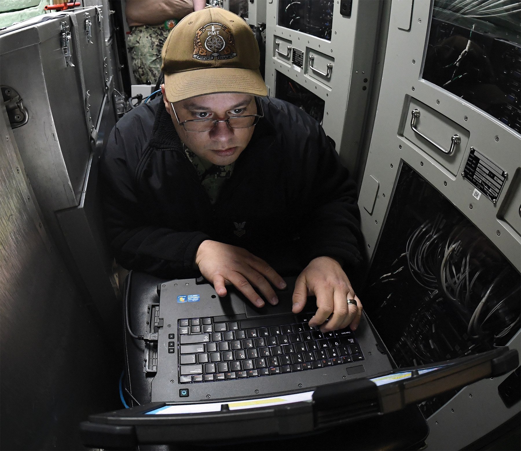 A sonar technician performs system maintenance on board the Virginia-class nuclear-powered attack submarine USS Virginia (SSN-774). Artificial intelligence has multiple potential uses in the submarine fleet, including enhancing analysis of sonar data and helping sonar technicians distinguish target signals faster and more consistently.