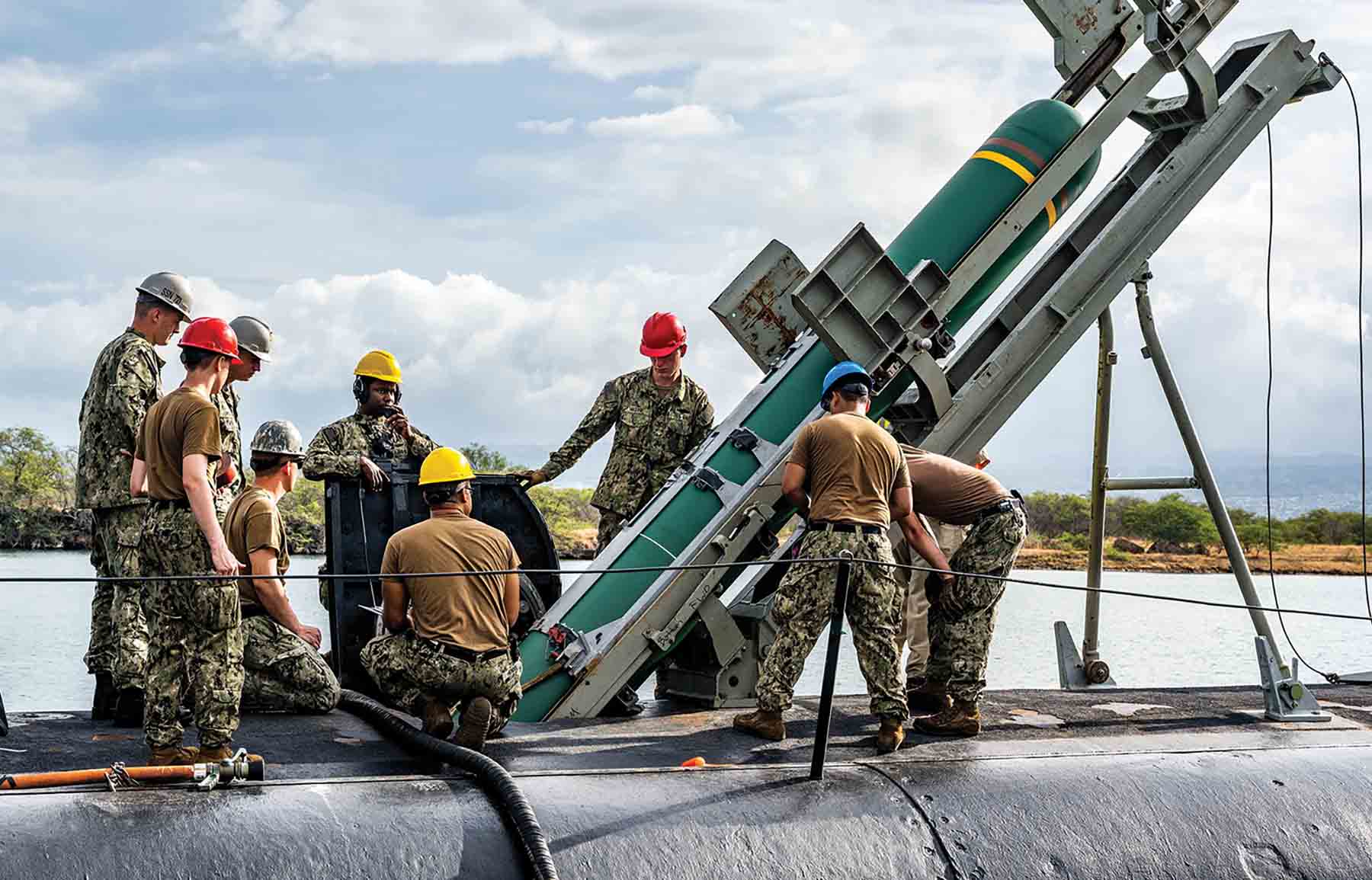 A Harpoon antiship missile is loaded onto the Los Angeles–class fast-attack submarine USS Chicago (SSN-721). Differences in weapon delivery systems, however, mean most of the SSN fleet is incapable of using the Harpoon. The Navy needs an affordable conventionally powered cruise-missile submarine.
