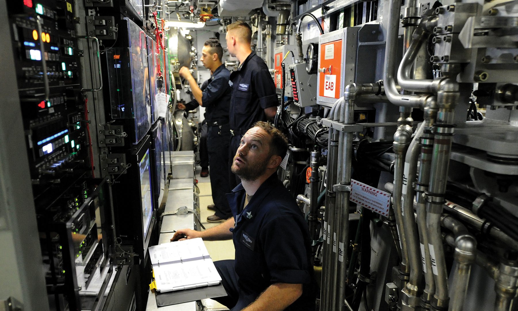 Sailors working on board the Virginia-class nuclear-powered submarine USS Indiana (SSN-789). For the cost of one Virginia-class SSN, the Navy could acquire four diesel submarines.