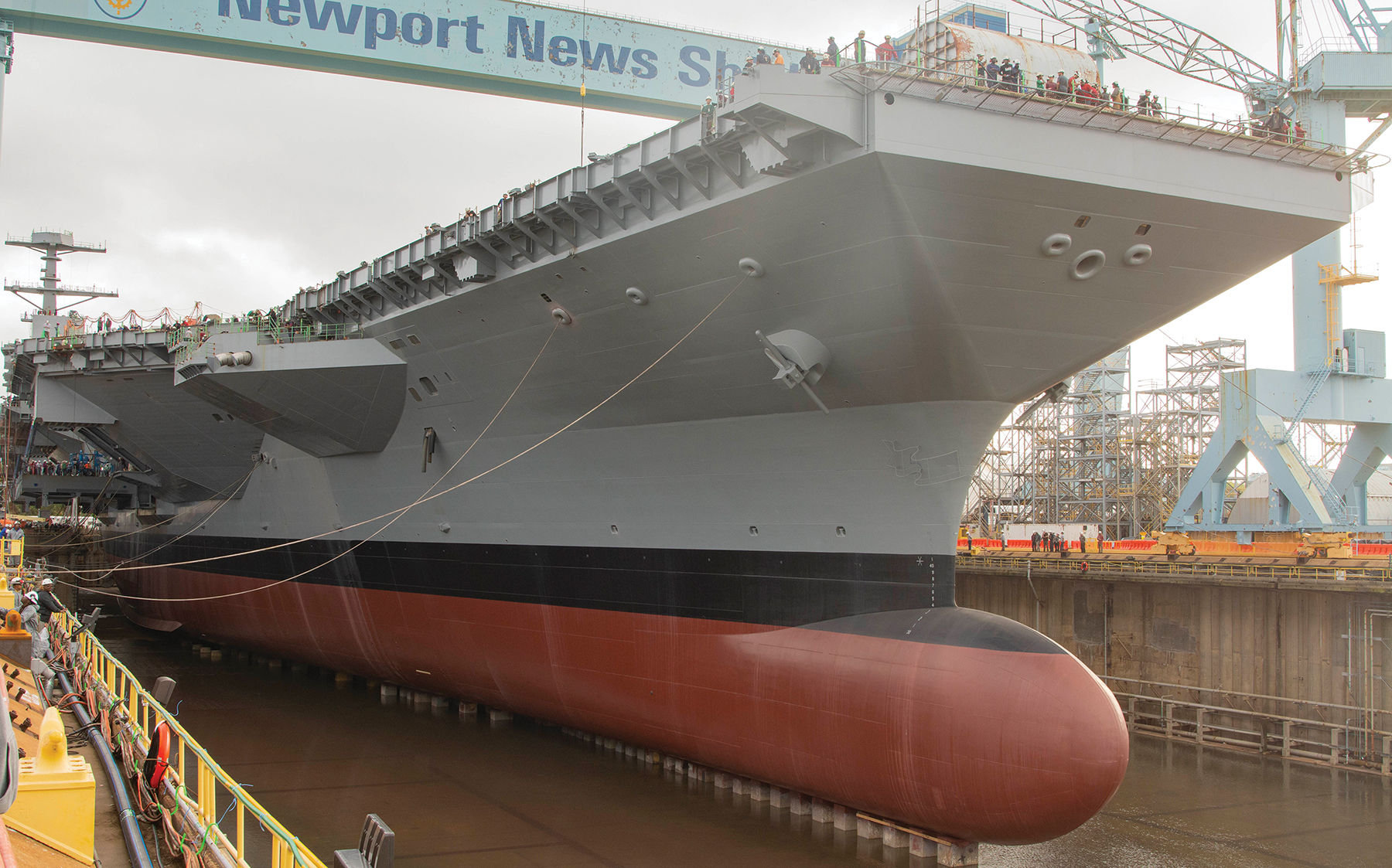 The aircraft carrier Pre-Commissioning Unit John F. Kennedy (CVN-79) as its drydock is flooded on 29 October 2019. The John F. Kennedy was christened on  7 December and is the second of the new Ford-class nuclear-powered carriers. The Navy also has stood up the Future Carrier 2030 Task Force to study how carriers will hold up against threats from Russia and China.  