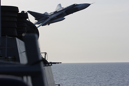 A Russian Sukhoi SU-24 attack aircraft making a very low pass close to the U.S. guided-missile destroyer USS Donald Cook (DDG-75) in the Baltic Sea. 