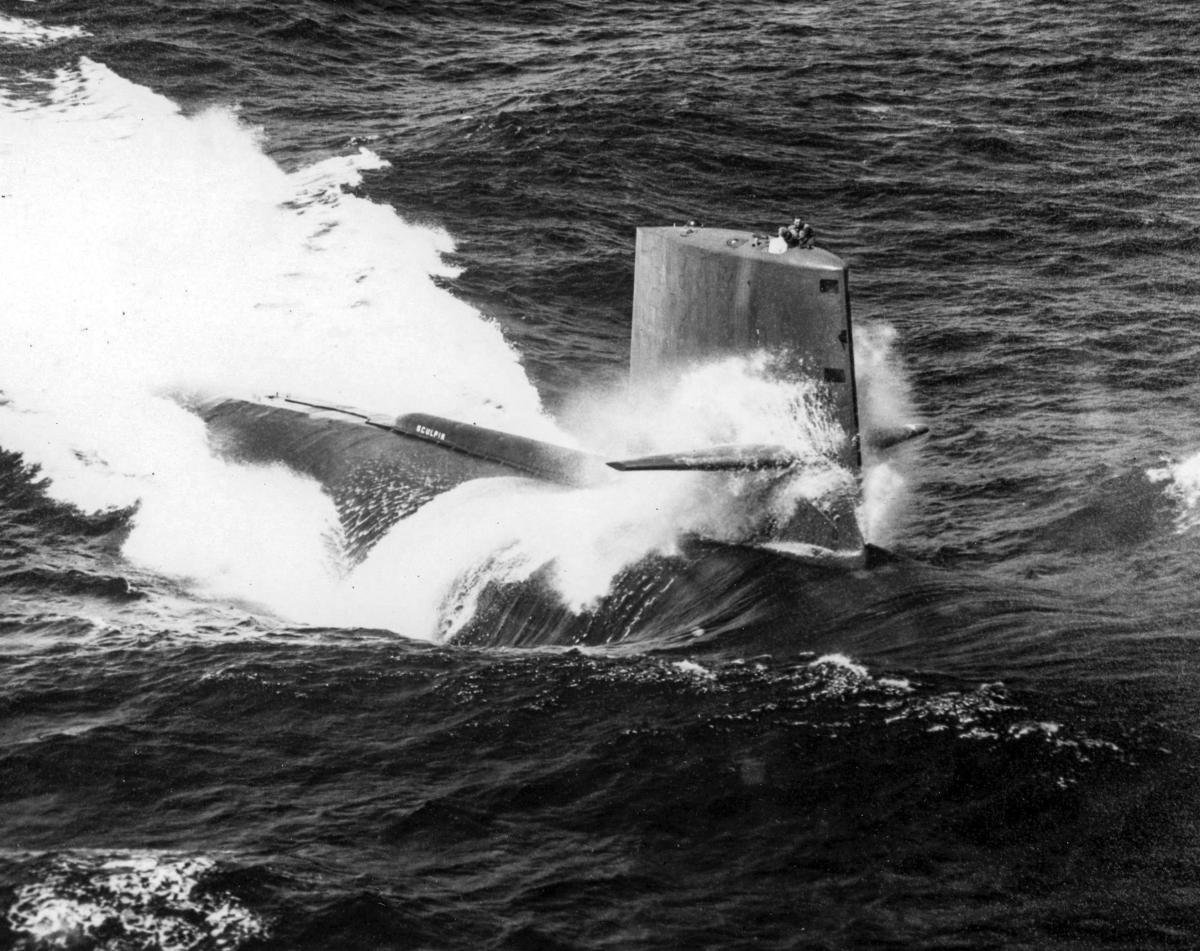 Aerial starboard oblique view of the USS Sculpin (SSN-590) underway on the surface