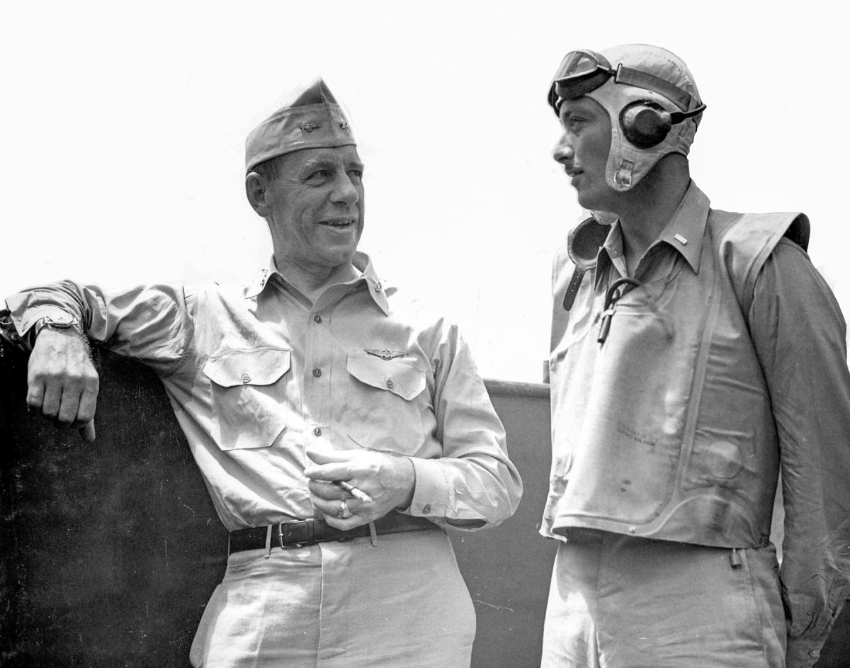Rear Admiral Frederick Sherman chats with Lieutenant (junior grade) Harold Buell