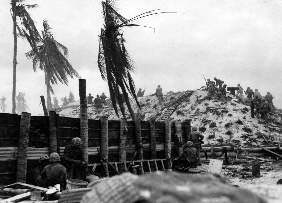 Marines swarm on top of one of the most formidable Japanese defenses on Betio