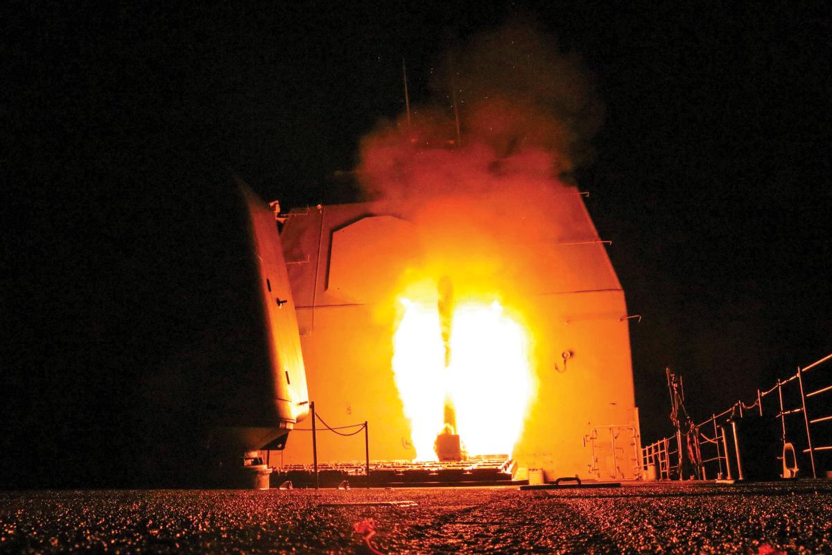 The guided-missile cruiser USS Monterey (CG-61) fires a Tomahawk land attack missile