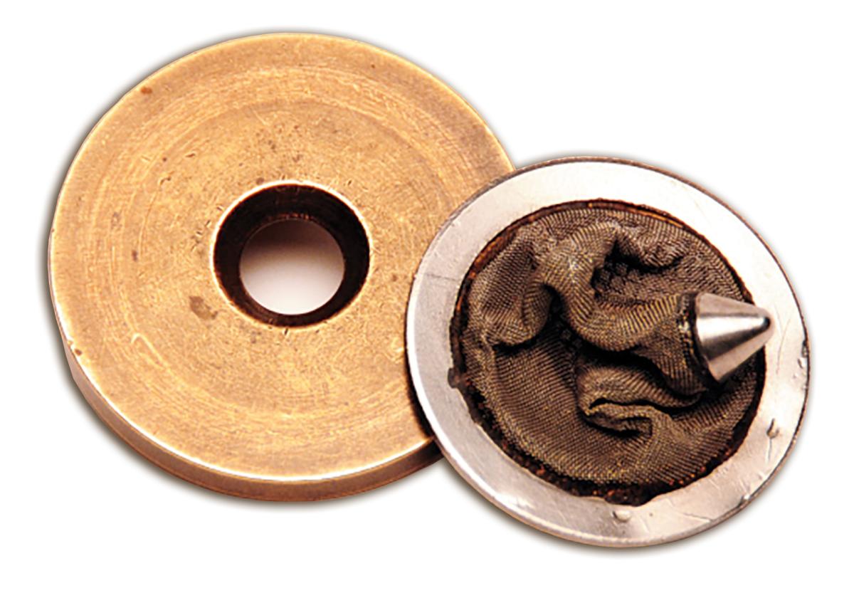 one of two collapsed conical strainers and orifice plates found in the USS Tinosa's (SSN-606) inlet to the 4,500–3,000 PSI air reducers