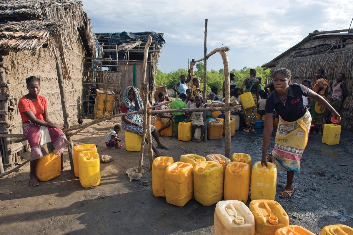 Women filling containers with drinking water Quelimane Mozambique