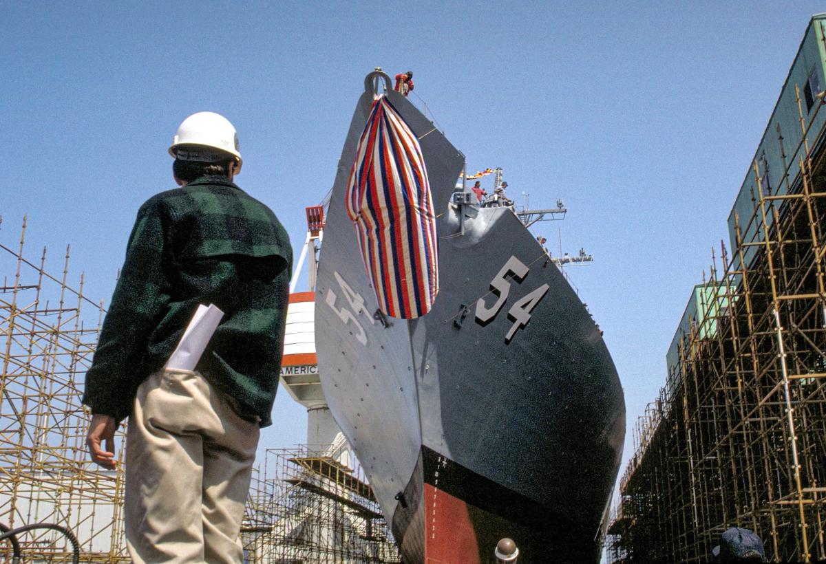 A bow view of the guided missile destroyer CURTIS WILBUR (DDG-54) just prior to its launching from the ways at the Bath Iron Works Co. shipyard.