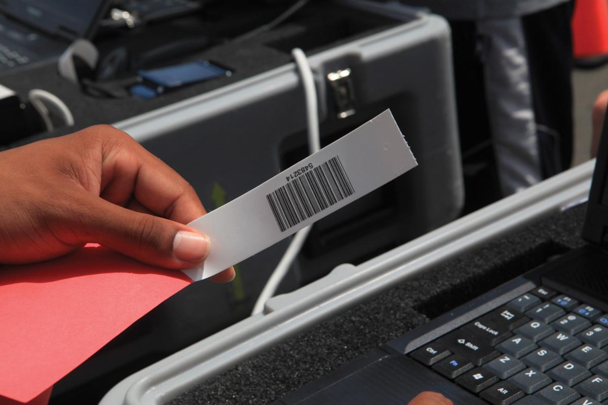 Barcode used to track Marines and sailors acting during an Evacuation Control Center training exercise