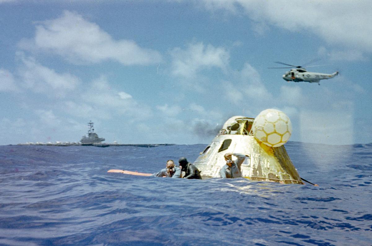Apollo 11 capsule in the ocean after splashdown.