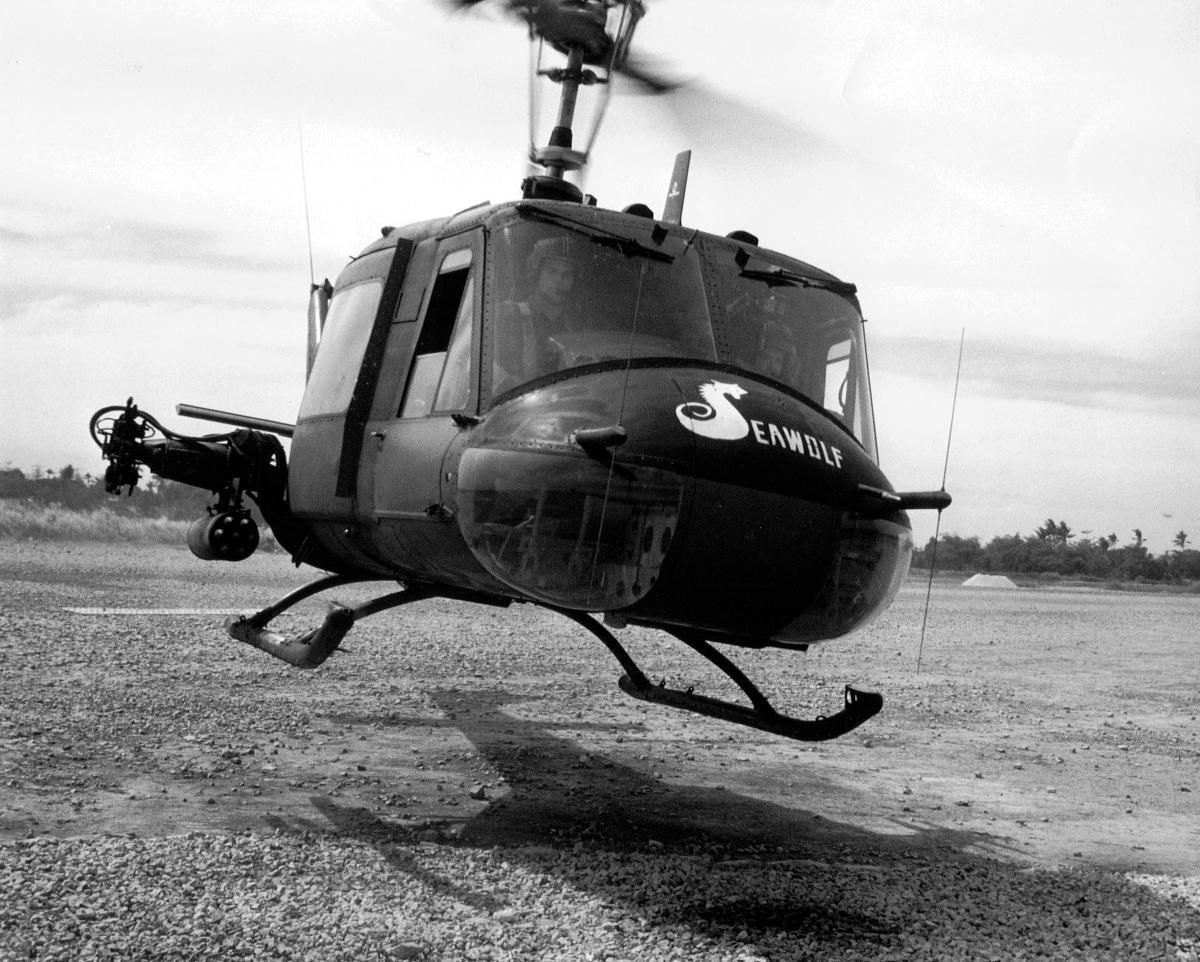 Closeup right front view of a UH-1B Huey helicopter of HA(L)-3 in flight.