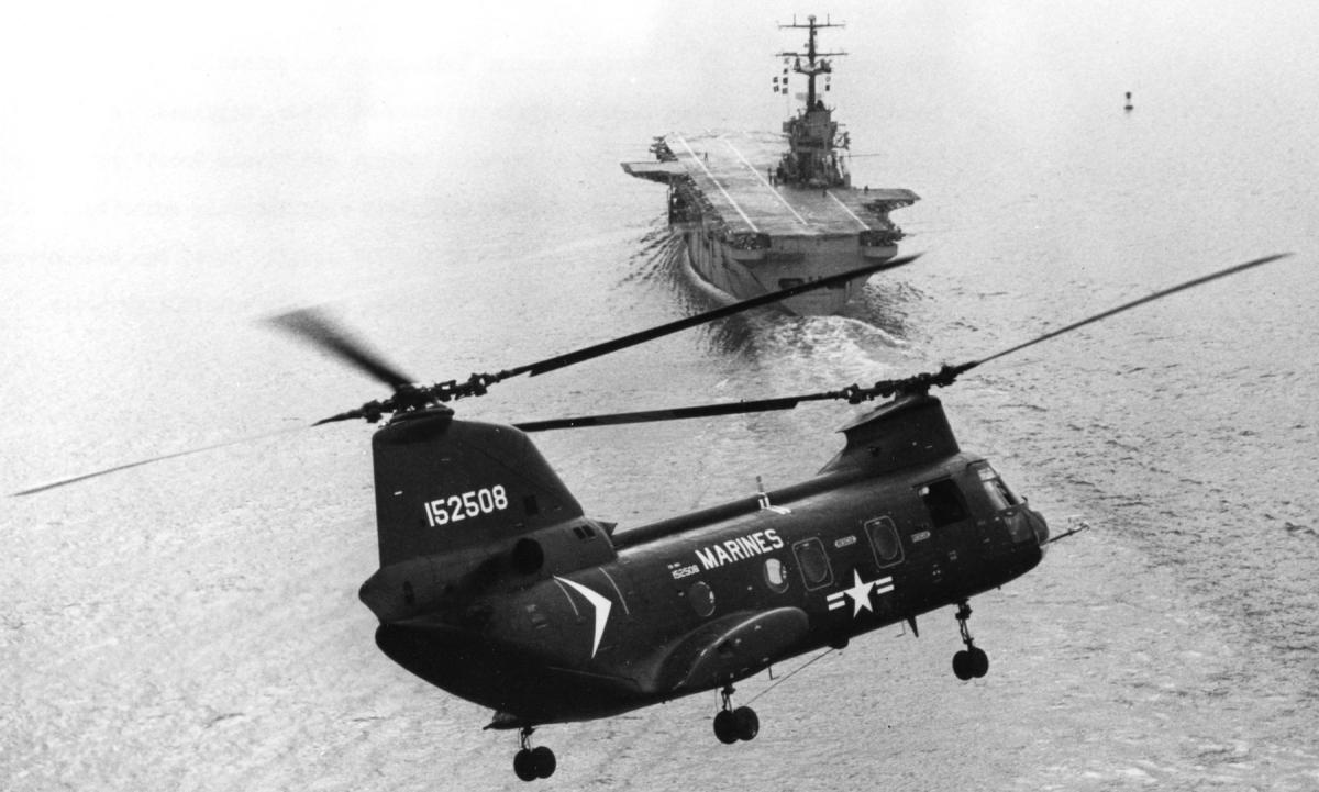 A Marine CH-46D Sea Knight helicopter prepares to land aboard the USS Guadalcanal (LPH-7)