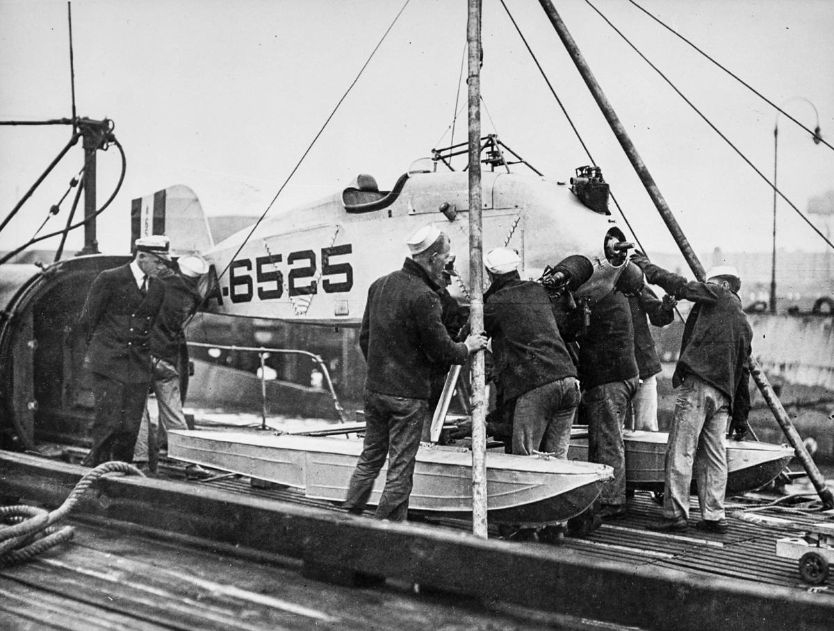 S-1 scouting seaplane being assembled on the after deck of USS S-1 (SS-105)