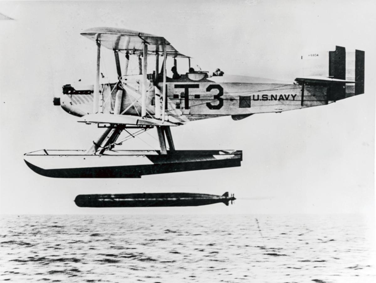 Left profile view of a Martin SC-1 dropping a torpedo