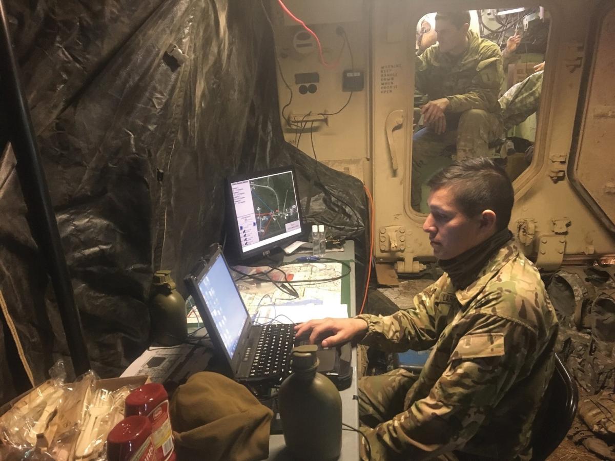 A member of the Cyber Electromagnetic Activities (CEMA) team, 781st Military Intelligence Battalion, conducts cyberspace operations while supporting the 2nd Armored Brigade Combat Team, 1st Infantry Division, during the Danger Focus Field Exercise at Fort Riley, Kansas