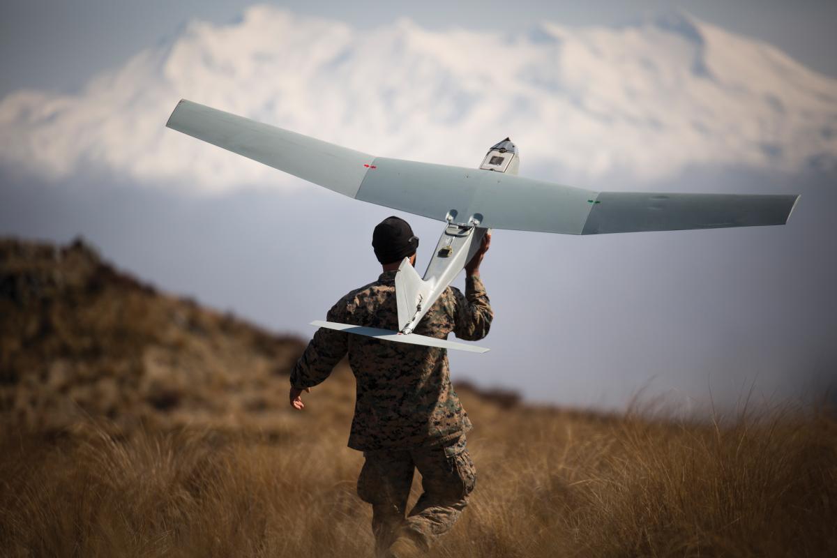 U.S. Marine Corps Sgt. Kevin Ware prepares to launch a Small Unmanned Aircraft System, as part of exercise Joint Assault Signals Company Black, Waiouru Military Camp, New Zealand, Sept. 13, 2018