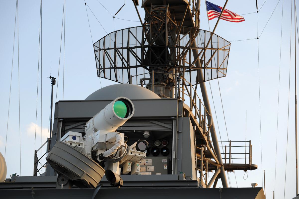 USS Ponce (ASB(I)-15) conducts an operational demonstration of the Laser Weapon System (LaWS) while deployed to the Arabian Gulf
