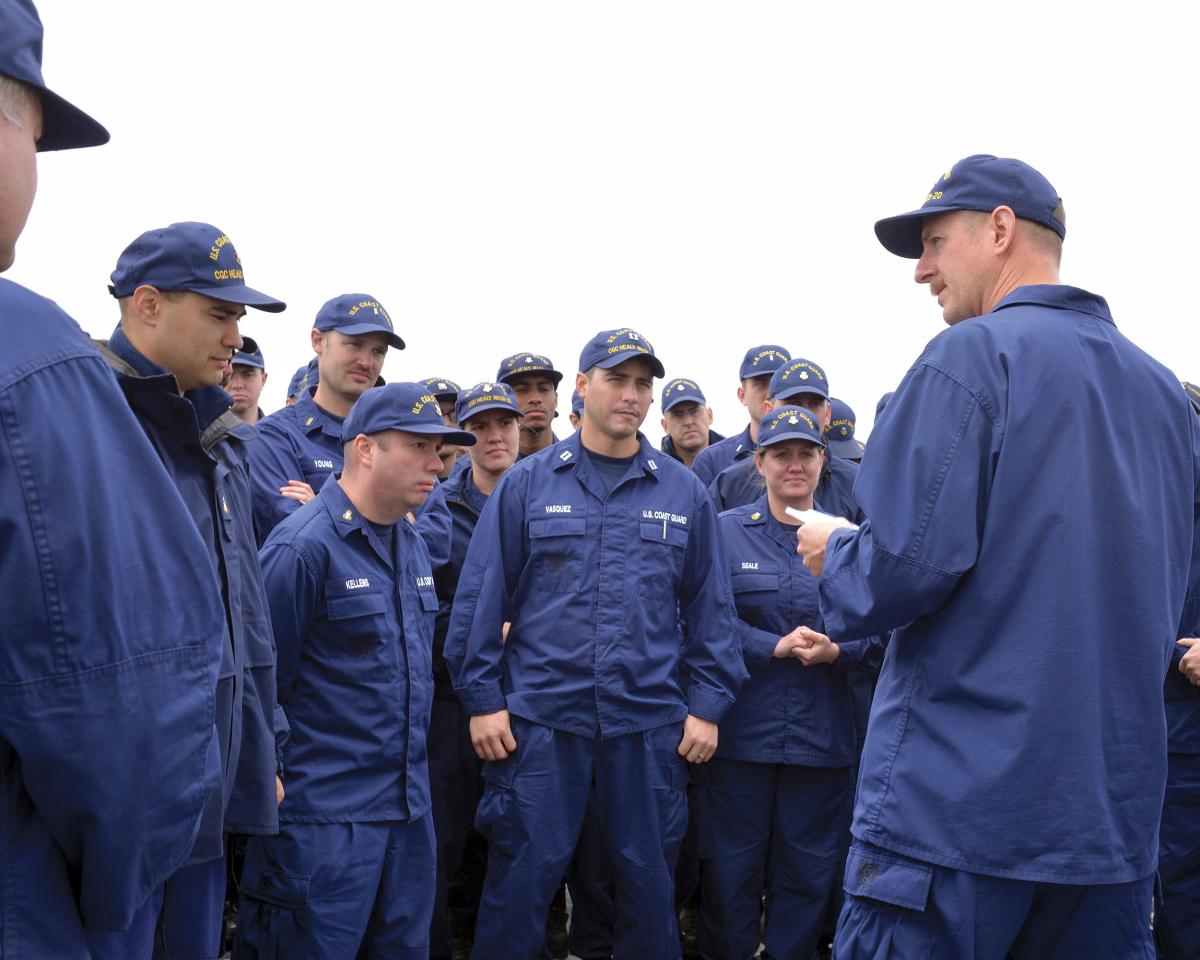 Capt. Greg Tlapa, commanding officer of the Coast Guard Cutter Healy (WAGB-20), addresses the crew during quarters in the Bering Sea off the coast of Alaska, July 25, 2017
