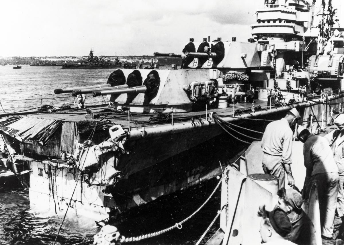 USS Pittsburgh (CA-72) at Guam, Mariana Islands after riding out a typhoon.