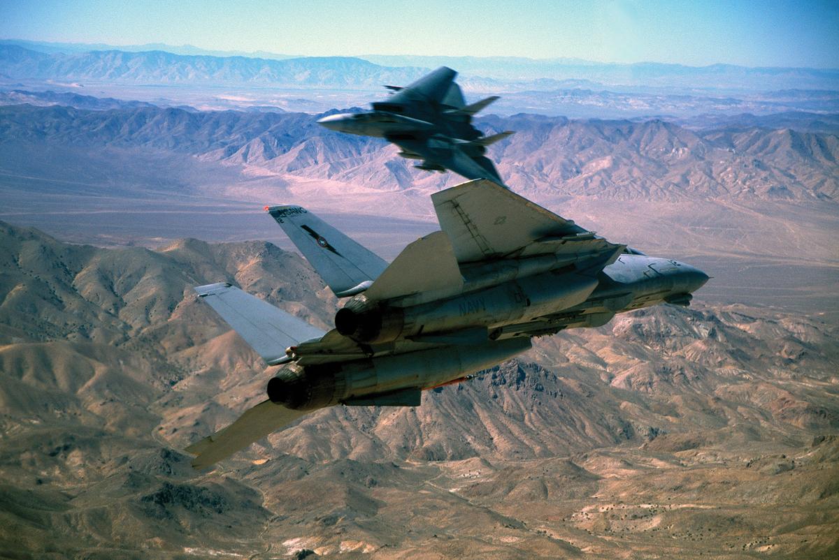 Two F-14 Tomcats go “beak to beak” in the skies near Fallon, Nevada