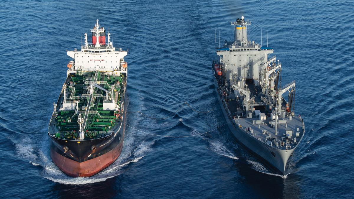 USNS Yukon (T-AO-202) and tanker MT Empire State conduct underway replenishment.