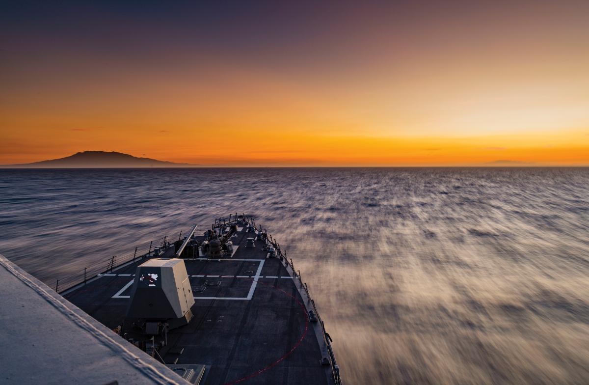 USS Michael Murphy (DDG-112) transits the South China Sea at sunset